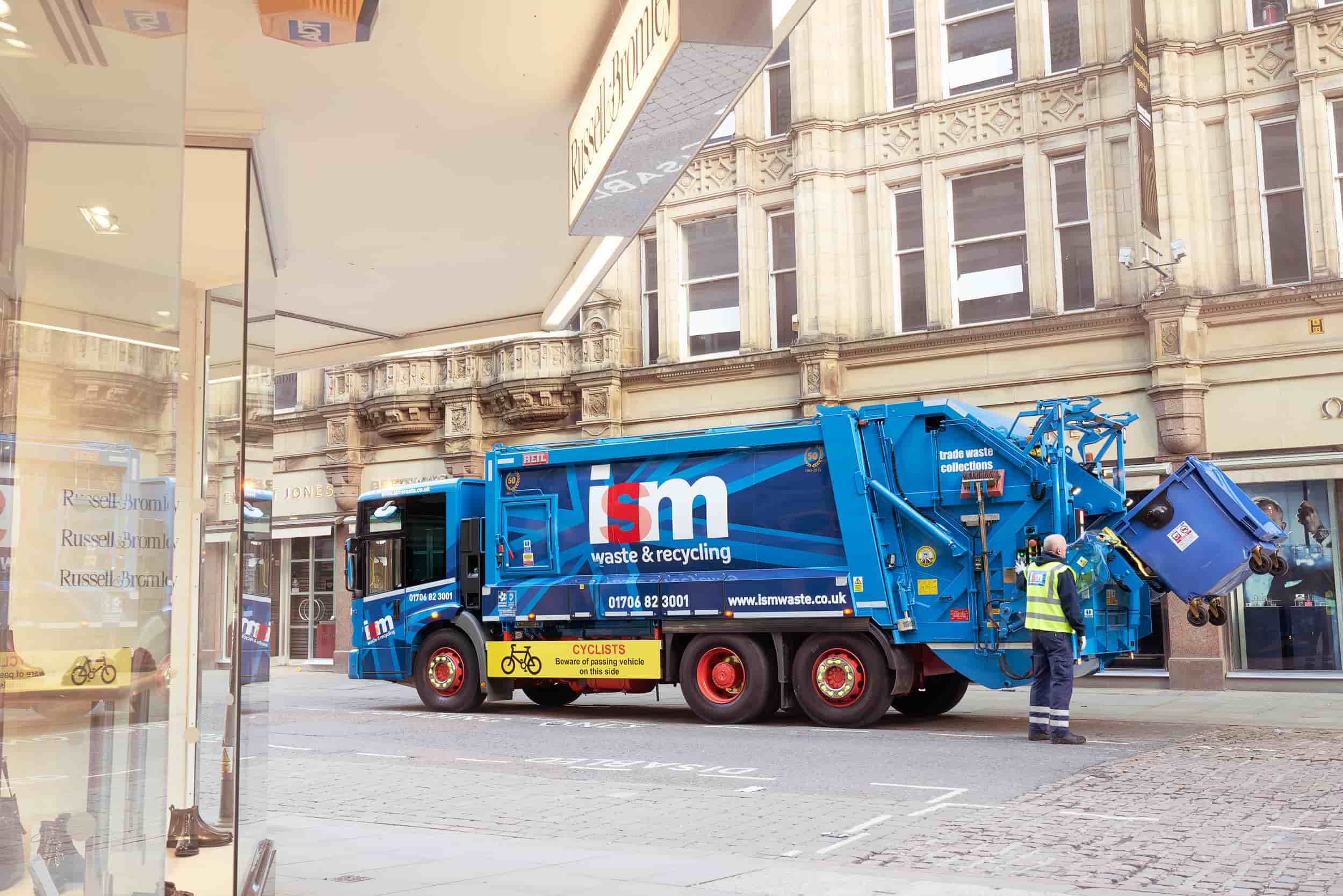 Mercedes Econic trade waste truck in Manchester city centre
