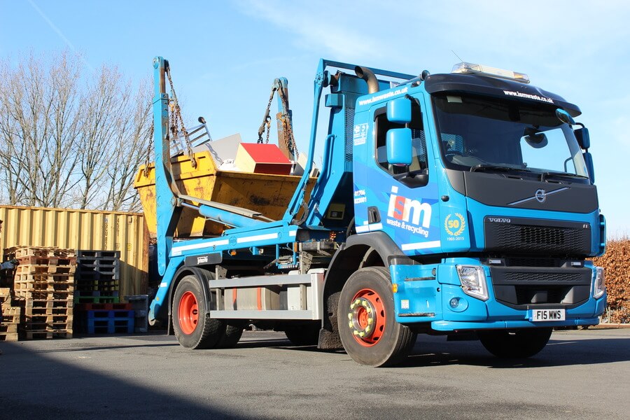 Skip hire collection at a customers site