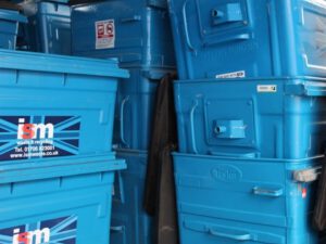 Commercial waste bins stacked up