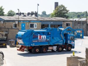 ISM FEL waste collection truck parked up at recycling facility